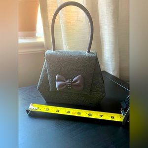 Grey little evening or day bag with a sweet look